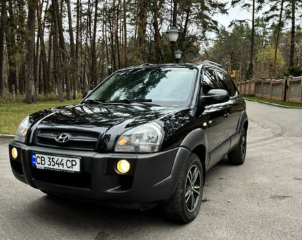 Черный Хендай Туксон, объемом двигателя 1.99 л и пробегом 266 тыс. км за 7500 $, фото 3 на Automoto.ua