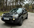 Черный Хендай Туксон, объемом двигателя 1.99 л и пробегом 266 тыс. км за 7500 $, фото 3 на Automoto.ua