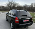 Черный Хендай Туксон, объемом двигателя 1.98 л и пробегом 159 тыс. км за 7600 $, фото 14 на Automoto.ua