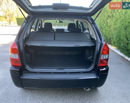 Чорний Хендай Туксон, об'ємом двигуна 2 л та пробігом 56 тис. км за 9500 $, фото 3 на Automoto.ua