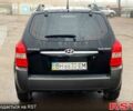Чорний Хендай Туксон, об'ємом двигуна 2 л та пробігом 154 тис. км за 7400 $, фото 4 на Automoto.ua