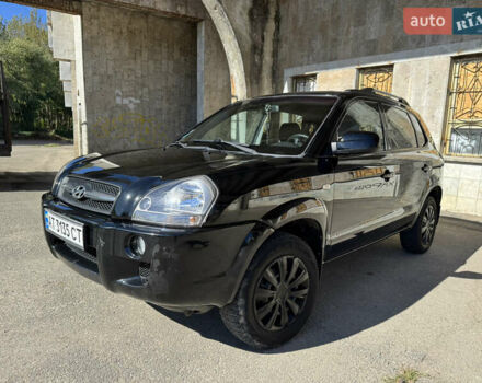 Черный Хендай Туксон, объемом двигателя 2 л и пробегом 189 тыс. км за 8250 $, фото 3 на Automoto.ua