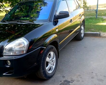 Чорний Хендай Туксон, об'ємом двигуна 2 л та пробігом 230 тис. км за 6900 $, фото 1 на Automoto.ua