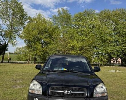 Чорний Хендай Туксон, об'ємом двигуна 2 л та пробігом 186 тис. км за 8099 $, фото 4 на Automoto.ua