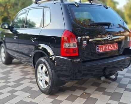 Черный Хендай Туксон, объемом двигателя 2 л и пробегом 190 тыс. км за 8150 $, фото 11 на Automoto.ua
