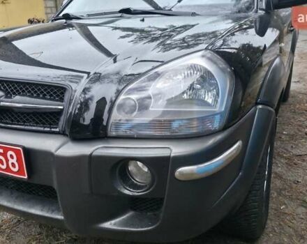 Чорний Хендай Туксон, об'ємом двигуна 2 л та пробігом 207 тис. км за 8200 $, фото 13 на Automoto.ua