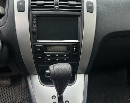 Черный Хендай Туксон, объемом двигателя 1.98 л и пробегом 147 тыс. км за 8000 $, фото 28 на Automoto.ua