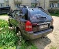 Черный Хендай Туксон, объемом двигателя 2 л и пробегом 223 тыс. км за 7500 $, фото 4 на Automoto.ua