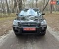 Черный Хендай Туксон, объемом двигателя 2 л и пробегом 198 тыс. км за 7800 $, фото 1 на Automoto.ua