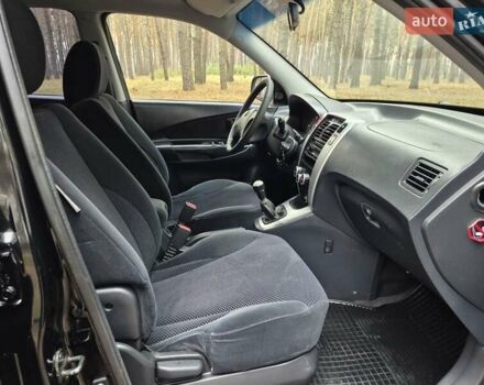 Черный Хендай Туксон, объемом двигателя 2 л и пробегом 198 тыс. км за 7800 $, фото 11 на Automoto.ua