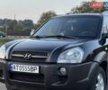 Черный Хендай Туксон, объемом двигателя 2 л и пробегом 186 тыс. км за 8300 $, фото 1 на Automoto.ua
