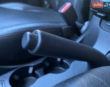 Черный Хендай Туксон, объемом двигателя 1.98 л и пробегом 286 тыс. км за 7300 $, фото 17 на Automoto.ua