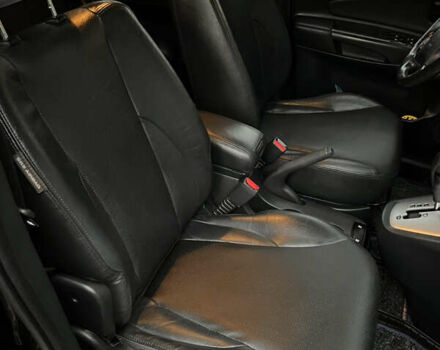 Черный Хендай Туксон, объемом двигателя 2 л и пробегом 151 тыс. км за 9100 $, фото 22 на Automoto.ua