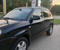 Черный Хендай Туксон, объемом двигателя 2 л и пробегом 192 тыс. км за 7950 $, фото 6 на Automoto.ua