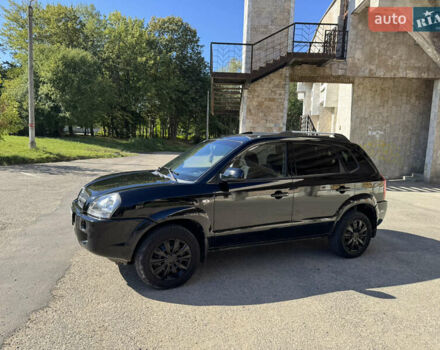 Черный Хендай Туксон, объемом двигателя 2 л и пробегом 189 тыс. км за 8250 $, фото 9 на Automoto.ua