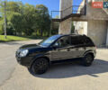Черный Хендай Туксон, объемом двигателя 2 л и пробегом 189 тыс. км за 8250 $, фото 9 на Automoto.ua