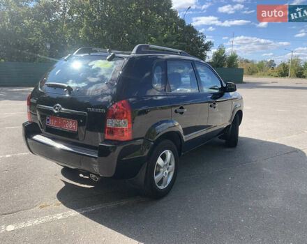 Чорний Хендай Туксон, об'ємом двигуна 2 л та пробігом 56 тис. км за 9500 $, фото 34 на Automoto.ua