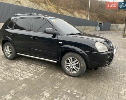Чорний Хендай Туксон, об'ємом двигуна 1.99 л та пробігом 345 тис. км за 7600 $, фото 13 на Automoto.ua