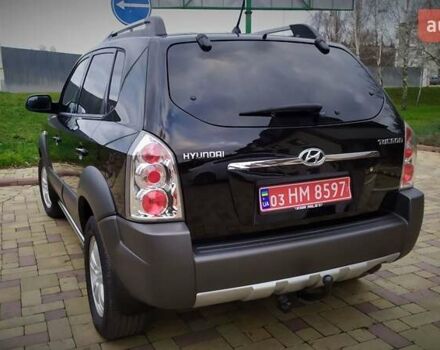 Чорний Хендай Туксон, об'ємом двигуна 2 л та пробігом 229 тис. км за 8600 $, фото 46 на Automoto.ua