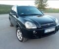 Черный Хендай Туксон, объемом двигателя 2 л и пробегом 240 тыс. км за 2700 $, фото 1 на Automoto.ua