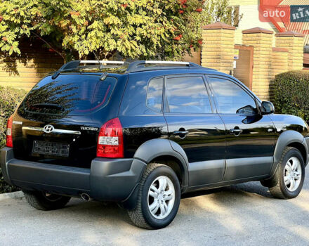 Черный Хендай Туксон, объемом двигателя 2 л и пробегом 167 тыс. км за 7800 $, фото 2 на Automoto.ua