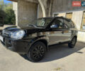 Черный Хендай Туксон, объемом двигателя 2 л и пробегом 189 тыс. км за 8250 $, фото 4 на Automoto.ua