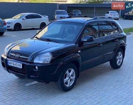 Черный Хендай Туксон, объемом двигателя 1.98 л и пробегом 286 тыс. км за 7300 $, фото 4 на Automoto.ua