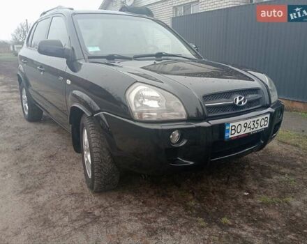 Черный Хендай Туксон, объемом двигателя 1.99 л и пробегом 235 тыс. км за 9000 $, фото 1 на Automoto.ua