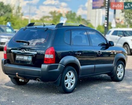 Черный Хендай Туксон, объемом двигателя 2 л и пробегом 227 тыс. км за 8200 $, фото 5 на Automoto.ua