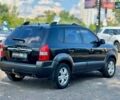 Черный Хендай Туксон, объемом двигателя 2 л и пробегом 227 тыс. км за 8200 $, фото 5 на Automoto.ua
