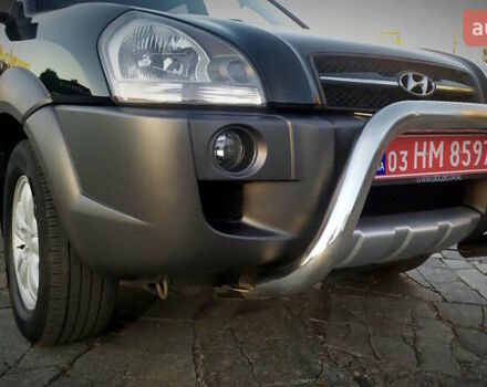 Черный Хендай Туксон, объемом двигателя 2 л и пробегом 230 тыс. км за 8600 $, фото 52 на Automoto.ua