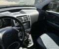 Чорний Хендай Туксон, об'ємом двигуна 2 л та пробігом 188 тис. км за 7000 $, фото 4 на Automoto.ua