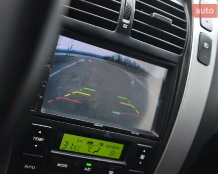 Черный Хендай Туксон, объемом двигателя 2 л и пробегом 183 тыс. км за 9150 $, фото 57 на Automoto.ua