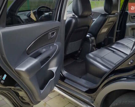 Чорний Хендай Туксон, об'ємом двигуна 2 л та пробігом 229 тис. км за 8600 $, фото 131 на Automoto.ua