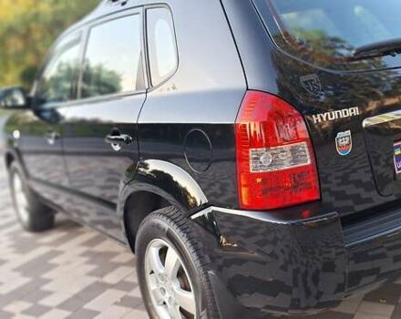 Черный Хендай Туксон, объемом двигателя 2 л и пробегом 190 тыс. км за 8150 $, фото 13 на Automoto.ua