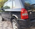 Черный Хендай Туксон, объемом двигателя 2 л и пробегом 190 тыс. км за 8150 $, фото 13 на Automoto.ua