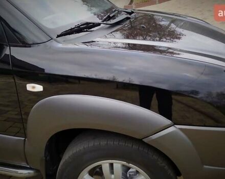 Чорний Хендай Туксон, об'ємом двигуна 2 л та пробігом 229 тис. км за 8600 $, фото 65 на Automoto.ua