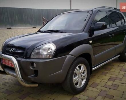 Чорний Хендай Туксон, об'ємом двигуна 2 л та пробігом 229 тис. км за 8600 $, фото 26 на Automoto.ua
