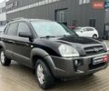 Черный Хендай Туксон, объемом двигателя 2 л и пробегом 163 тыс. км за 7690 $, фото 2 на Automoto.ua