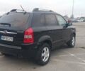 Черный Хендай Туксон, объемом двигателя 1.98 л и пробегом 155 тыс. км за 7999 $, фото 8 на Automoto.ua