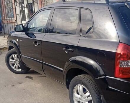 Чорний Хендай Туксон, об'ємом двигуна 1.99 л та пробігом 229 тис. км за 8199 $, фото 3 на Automoto.ua