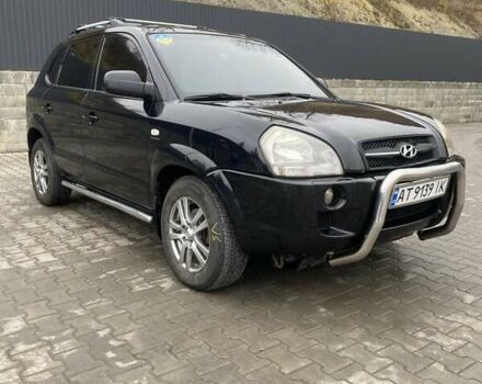 Чорний Хендай Туксон, об'ємом двигуна 1.99 л та пробігом 345 тис. км за 7600 $, фото 2 на Automoto.ua