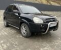 Чорний Хендай Туксон, об'ємом двигуна 1.99 л та пробігом 345 тис. км за 7600 $, фото 2 на Automoto.ua