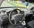 Черный Хендай Туксон, объемом двигателя 2 л и пробегом 270 тыс. км за 7000 $, фото 4 на Automoto.ua