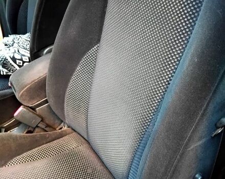 Черный Хендай Туксон, объемом двигателя 2 л и пробегом 270 тыс. км за 7400 $, фото 6 на Automoto.ua