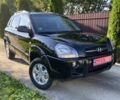 Черный Хендай Туксон, объемом двигателя 2 л и пробегом 197 тыс. км за 8400 $, фото 2 на Automoto.ua