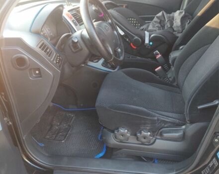 Черный Хендай Туксон, объемом двигателя 2 л и пробегом 289 тыс. км за 6600 $, фото 7 на Automoto.ua