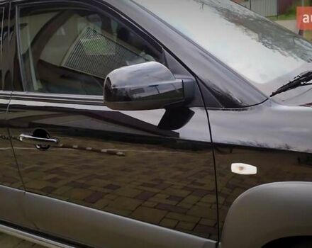 Чорний Хендай Туксон, об'ємом двигуна 2 л та пробігом 229 тис. км за 8600 $, фото 67 на Automoto.ua