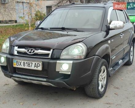 Черный Хендай Туксон, объемом двигателя 2 л и пробегом 270 тыс. км за 6800 $, фото 2 на Automoto.ua