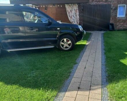 Черный Хендай Туксон, объемом двигателя 2 л и пробегом 15 тыс. км за 6200 $, фото 3 на Automoto.ua